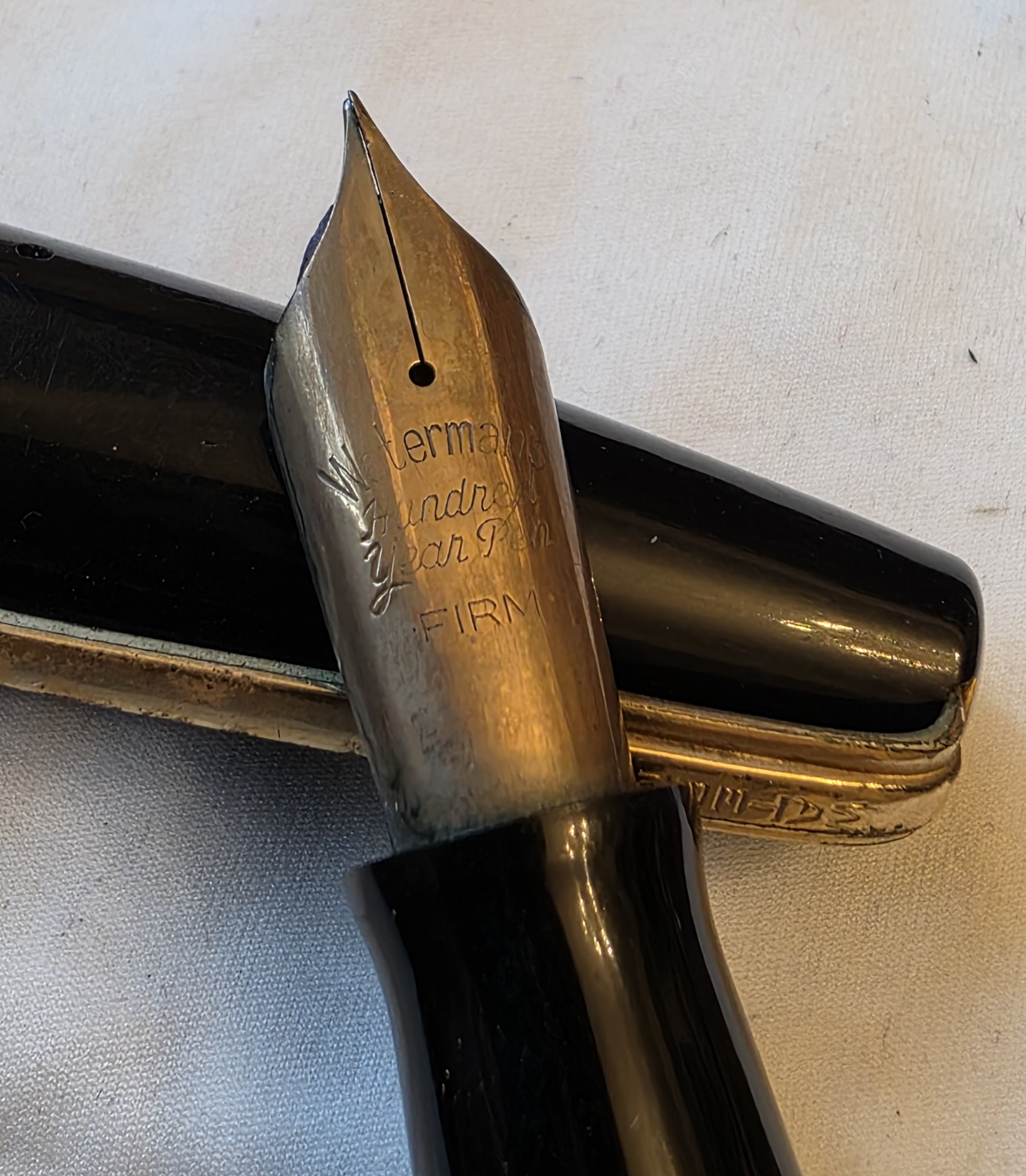 Close-up of the Waterman Hundred Year Pen nib and its engraved lettering